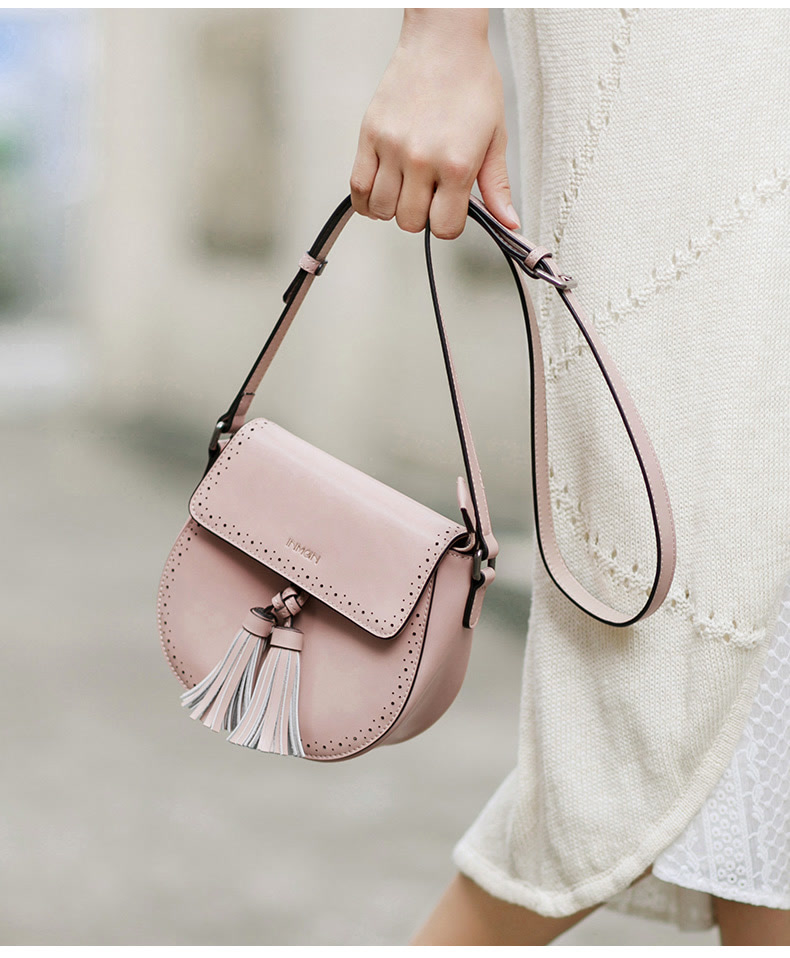 茵曼(inman)时尚复古流苏包 精致缕空翻盖牛皮包 文艺休闲女士小包包